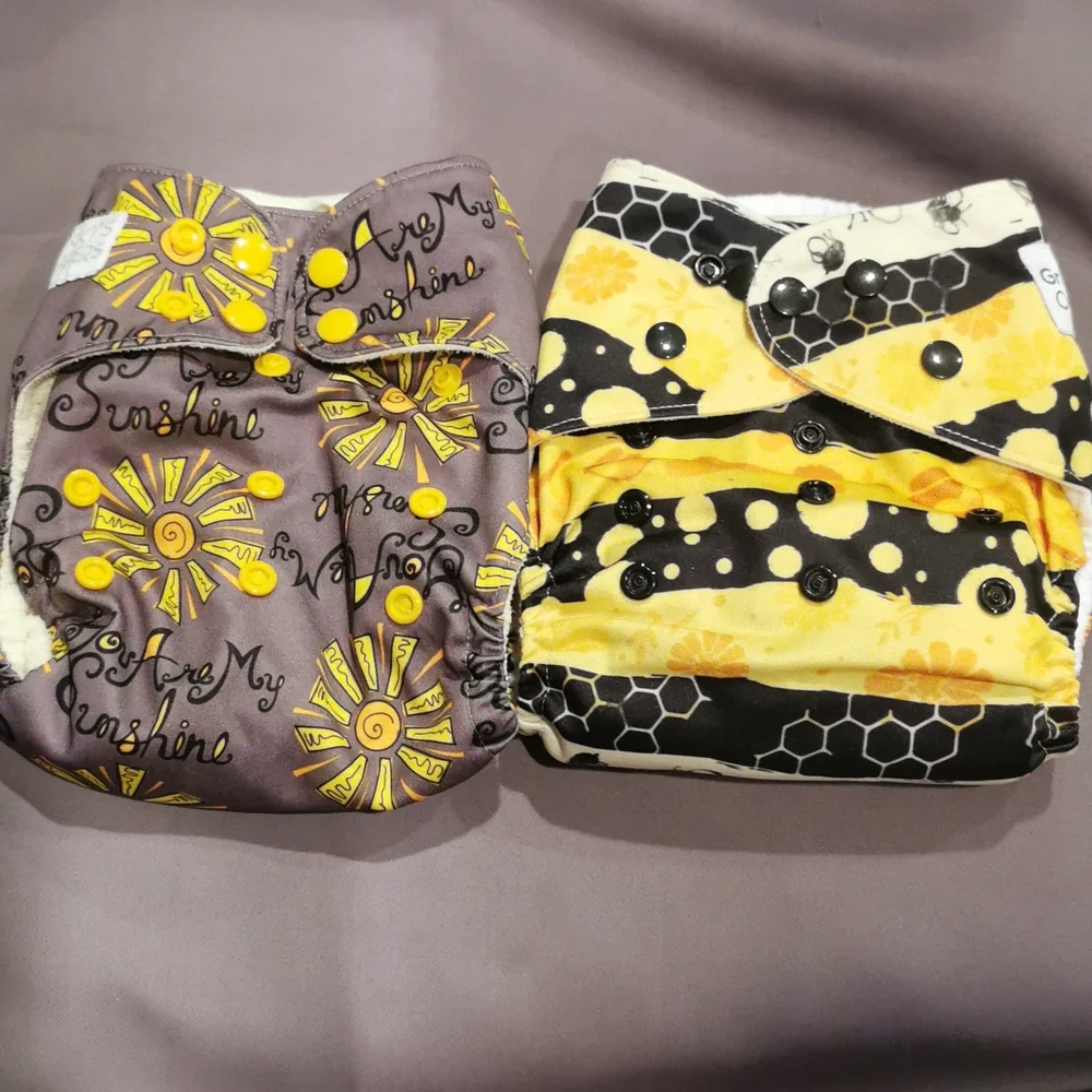 2 Reusable pocket cloth diapers, You are my Sunshine, bee hive, yellow